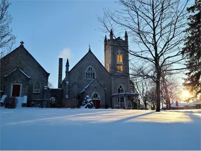 Church in winter with sunshine