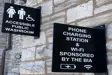 Public washroom signage on building