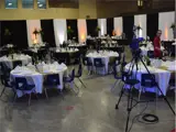 Room setup for special event with black and white decor accents