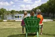 Woman and children sitting in chair in front of the swimming Quarry