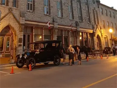 Car parked on road in front of bulding